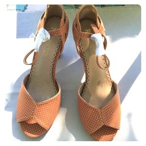 Restricted swiss dot peep toe heels